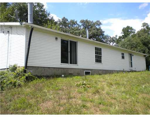 Exterior Back. Sliding Glass doors off rear view