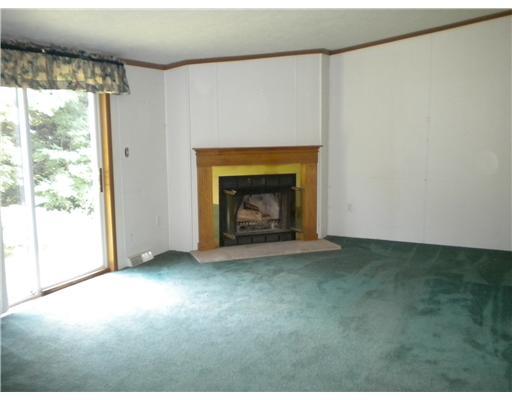 323 Pheasant Road Evans City, PA 16033 - Photo 8 of 14 Dining Room. Corner Fireplace