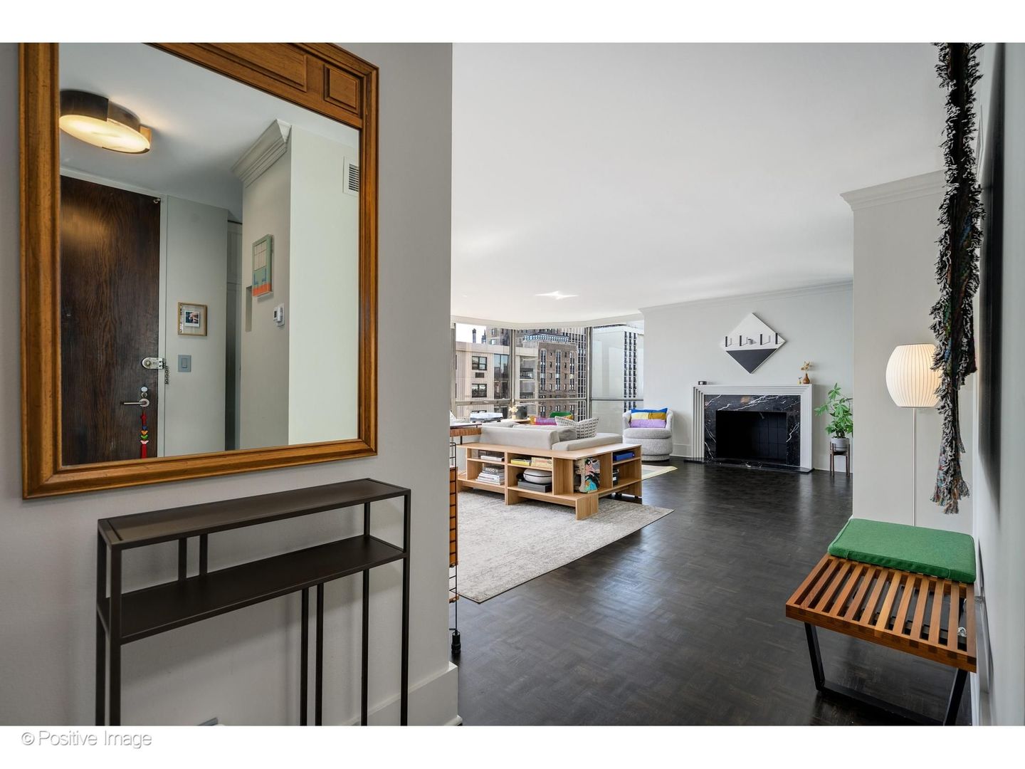 1310 North Ritchie Court, Unit 26C Chicago, IL 60610 - Photo 3 of 34 a living room with furniture and a fireplace