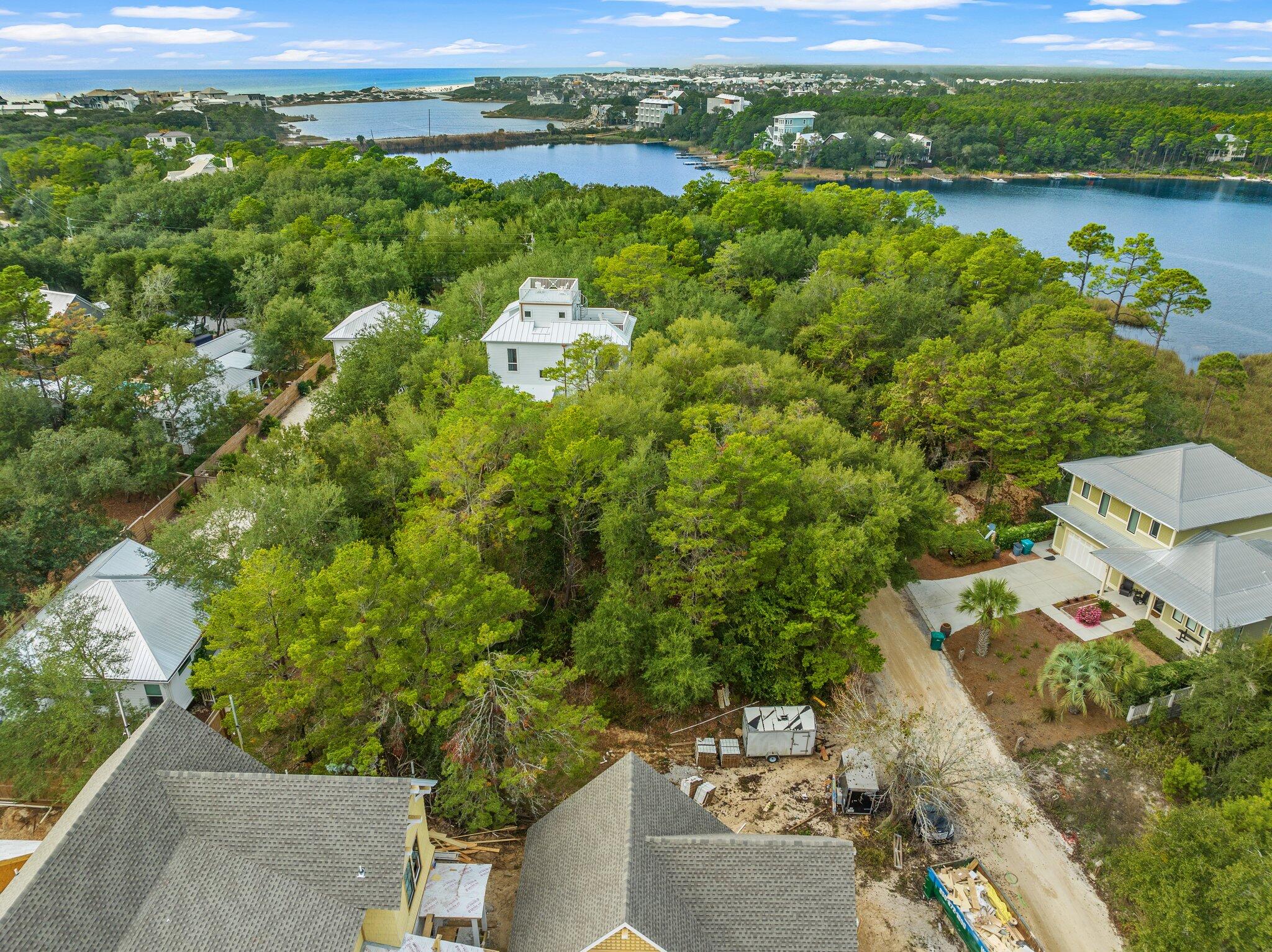 9 South Camp Creek Rd Inlet Beach Inlet Beach, FL 32461 - Photo 1 of 11 an aerial view of a house with a lake view