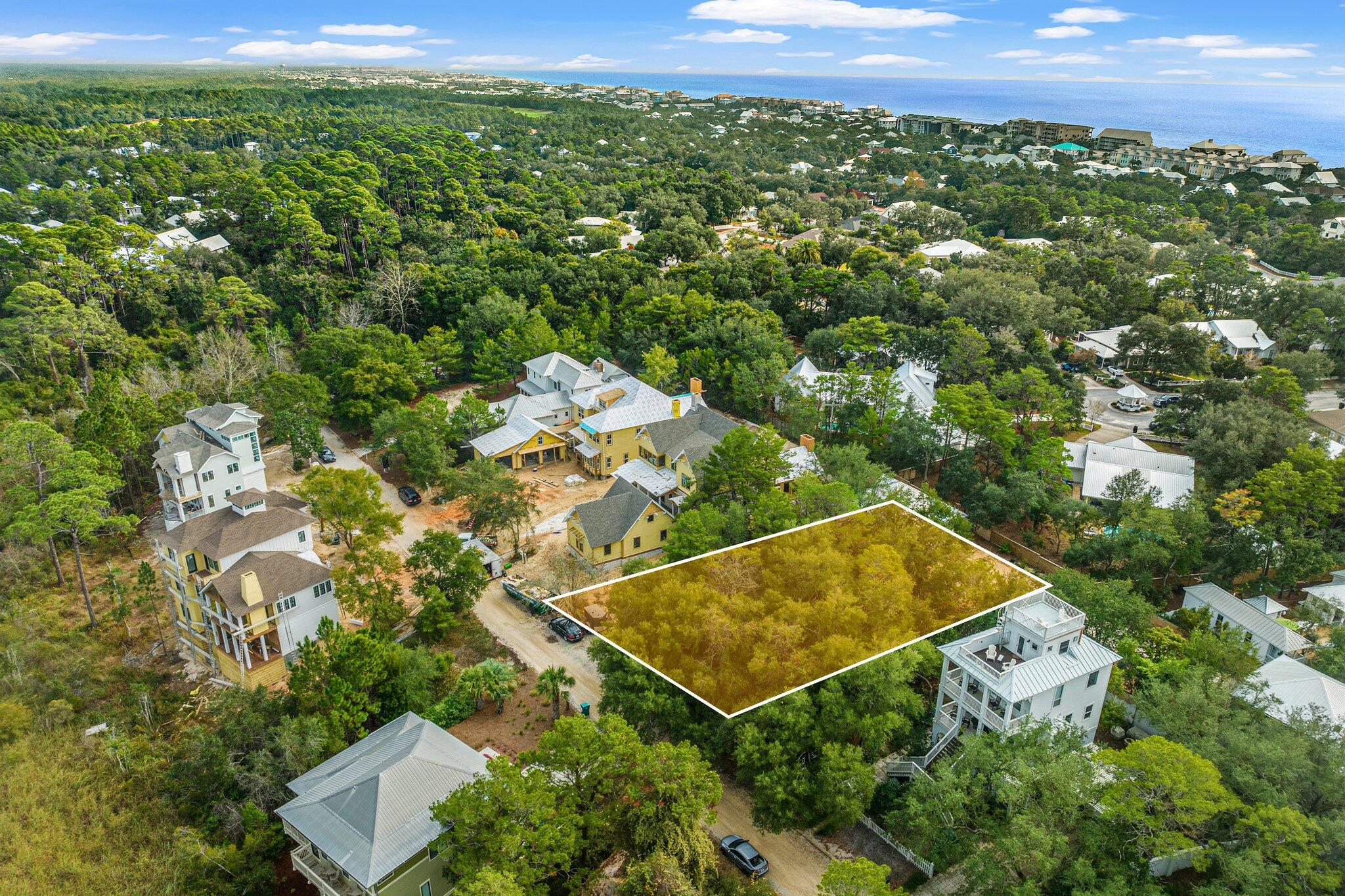 9 South Camp Creek Rd Inlet Beach Inlet Beach, FL 32461 - Photo 3 of 11 an aerial view of a house with a yard