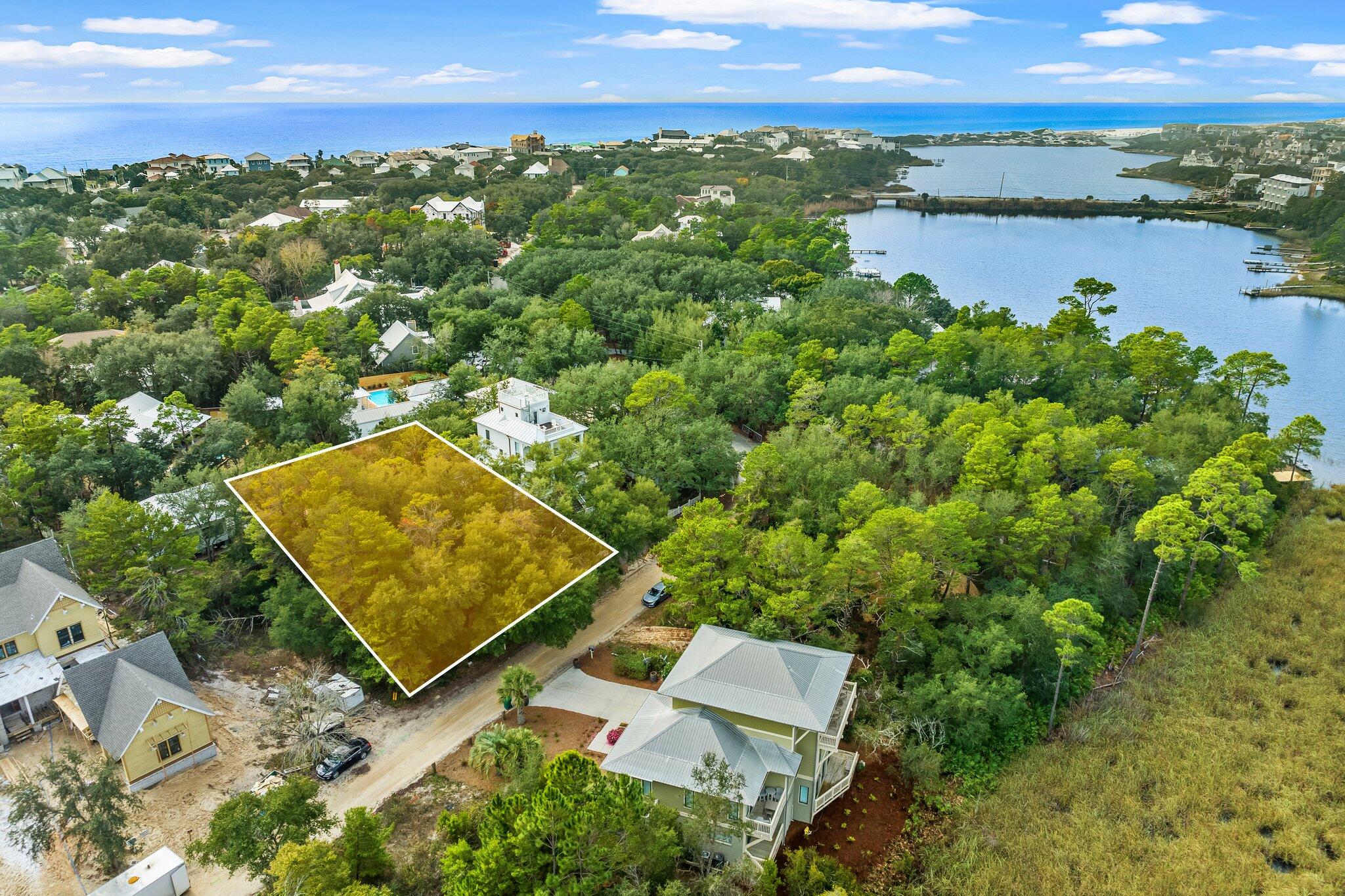 9 South Camp Creek Rd Inlet Beach Inlet Beach, FL 32461 - Photo 10 of 11 an aerial view of a house with a lake view