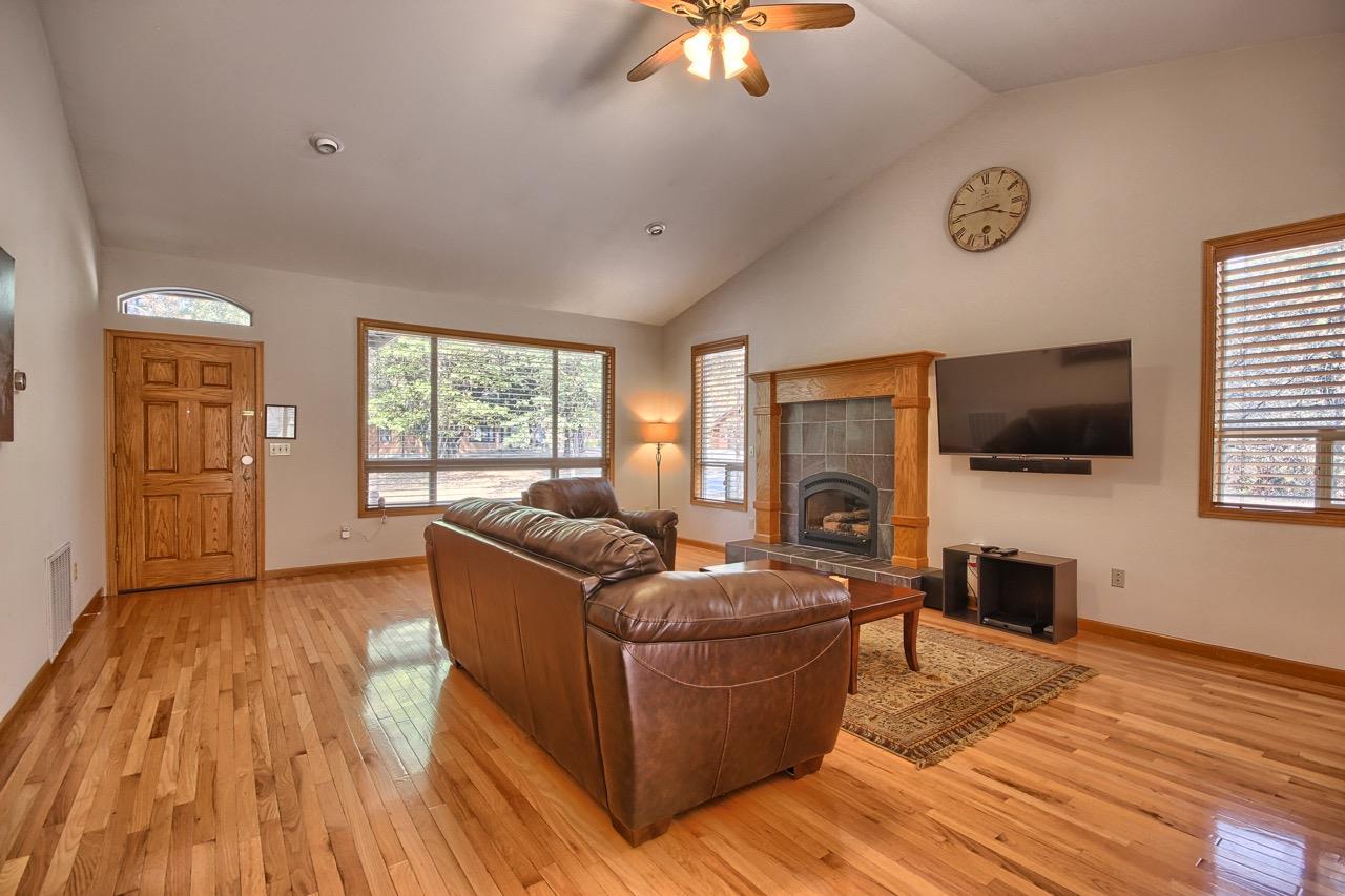 3293 Triangle Road Mariposa, CA 95338 - Photo 54 of 74 a living room with furniture fireplace and flat screen tv