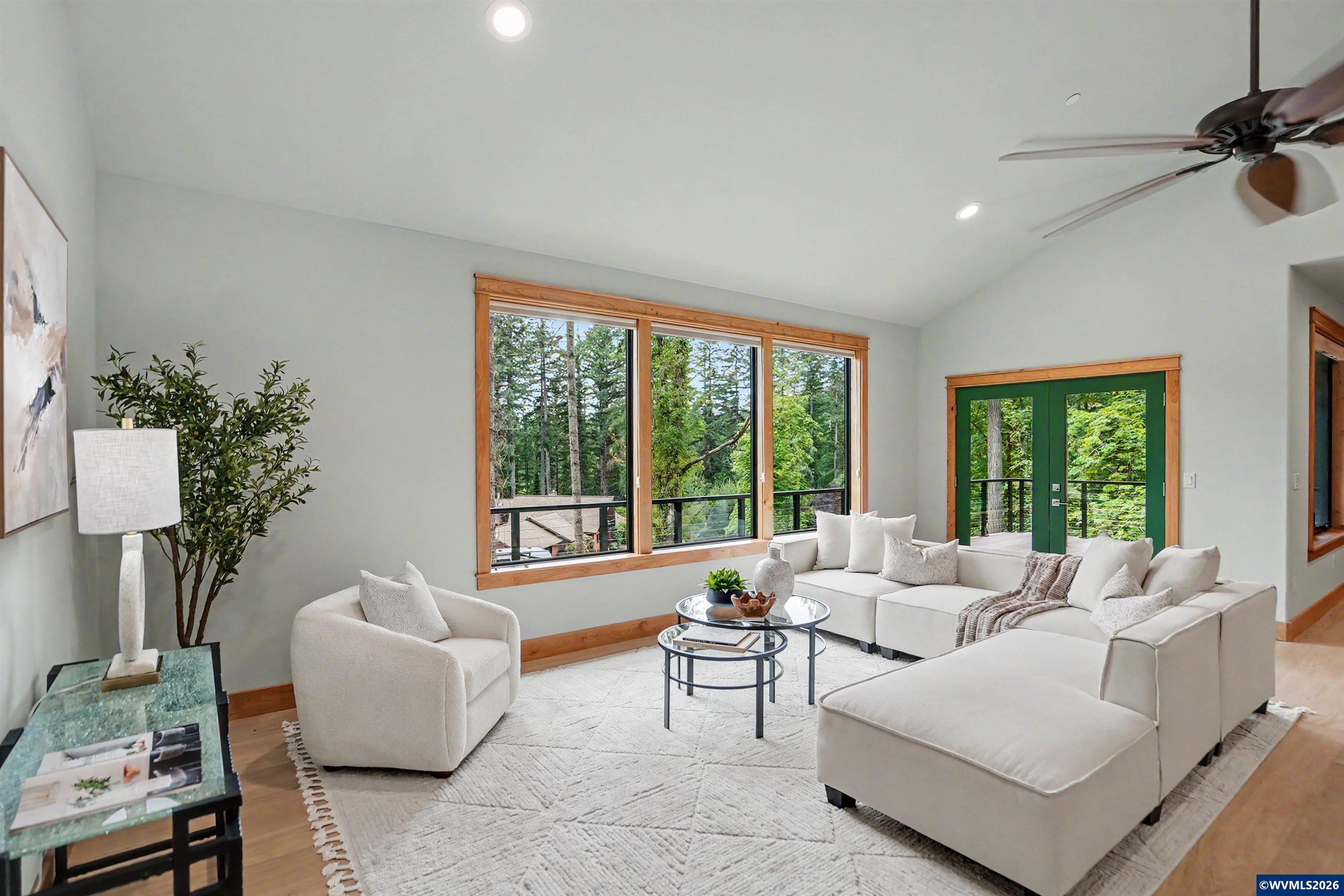 1155 Northwest Country Hills Road Corvallis, OR 97330 - Photo 37 of 48 a living room with furniture and a large window
