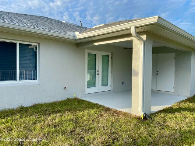 a view of deck and garden