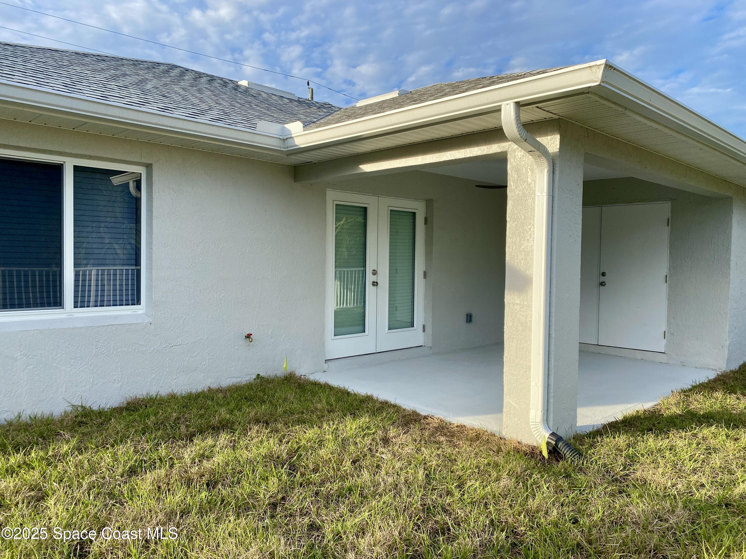 6005 Sisson Road Titusville, FL 32780 - Photo 14 of 16 a view of an entrance of the house
