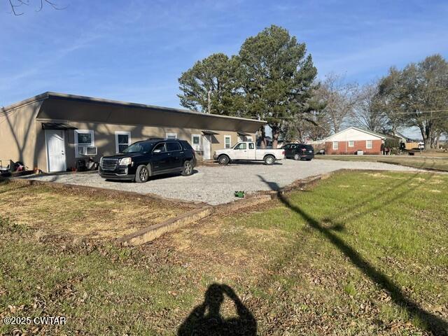 113 North West Street Rutherford, TN 38369 - Photo 5 of 16 a view of a yard with cars