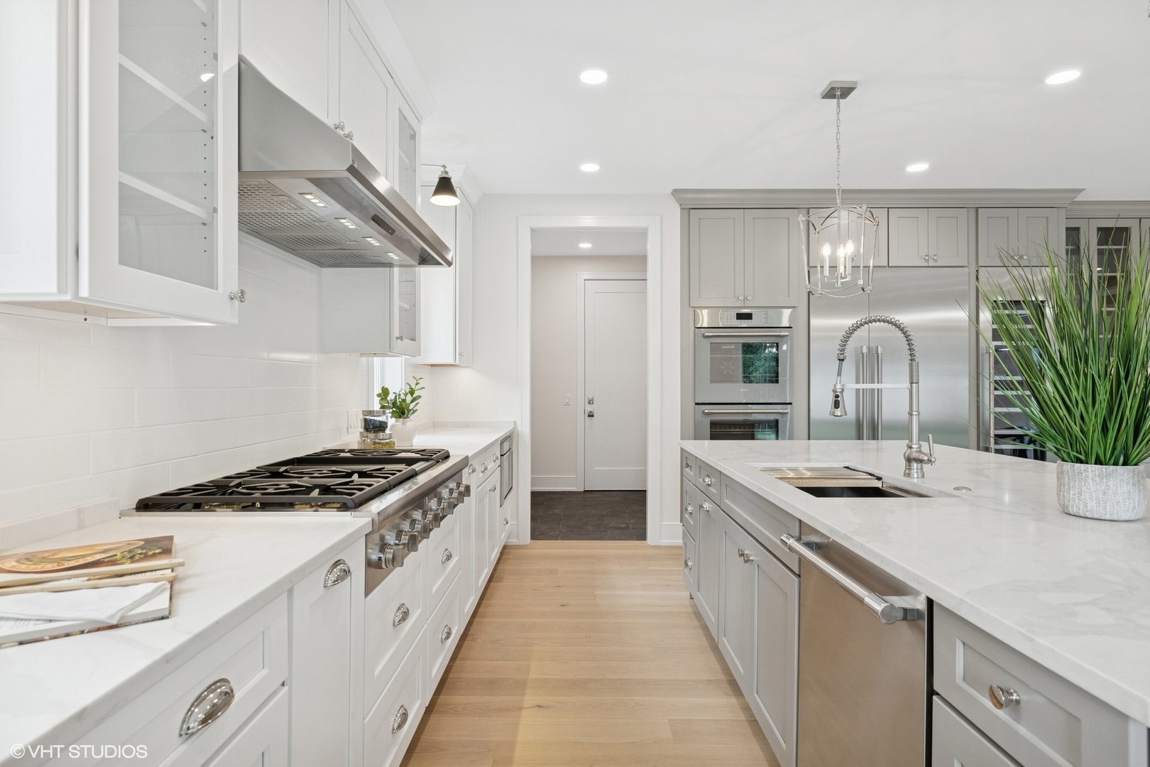 227 South Mitchell Avenue Arlington Heights, IL 60005 - Photo 12 of 40 a kitchen with granite countertop a sink stove and cabinets