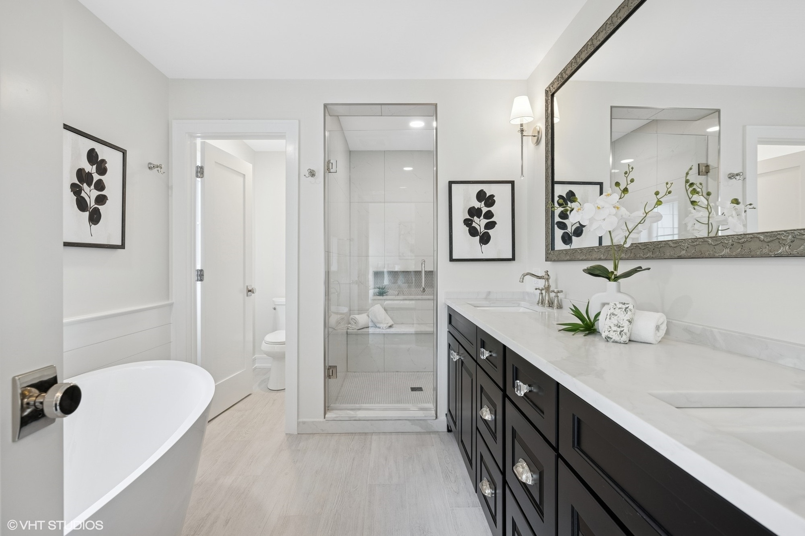 227 South Mitchell Avenue Arlington Heights, IL 60005 - Photo 20 of 40 a spacious bathroom with a granite countertop tub sink a mirror a shower and vanity