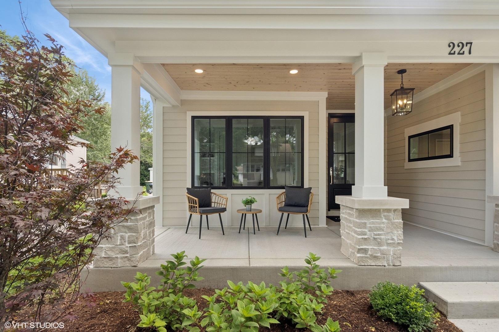 227 South Mitchell Avenue Arlington Heights, IL 60005 - Photo 2 of 40 a view of a patio with table and chairs and potted plants