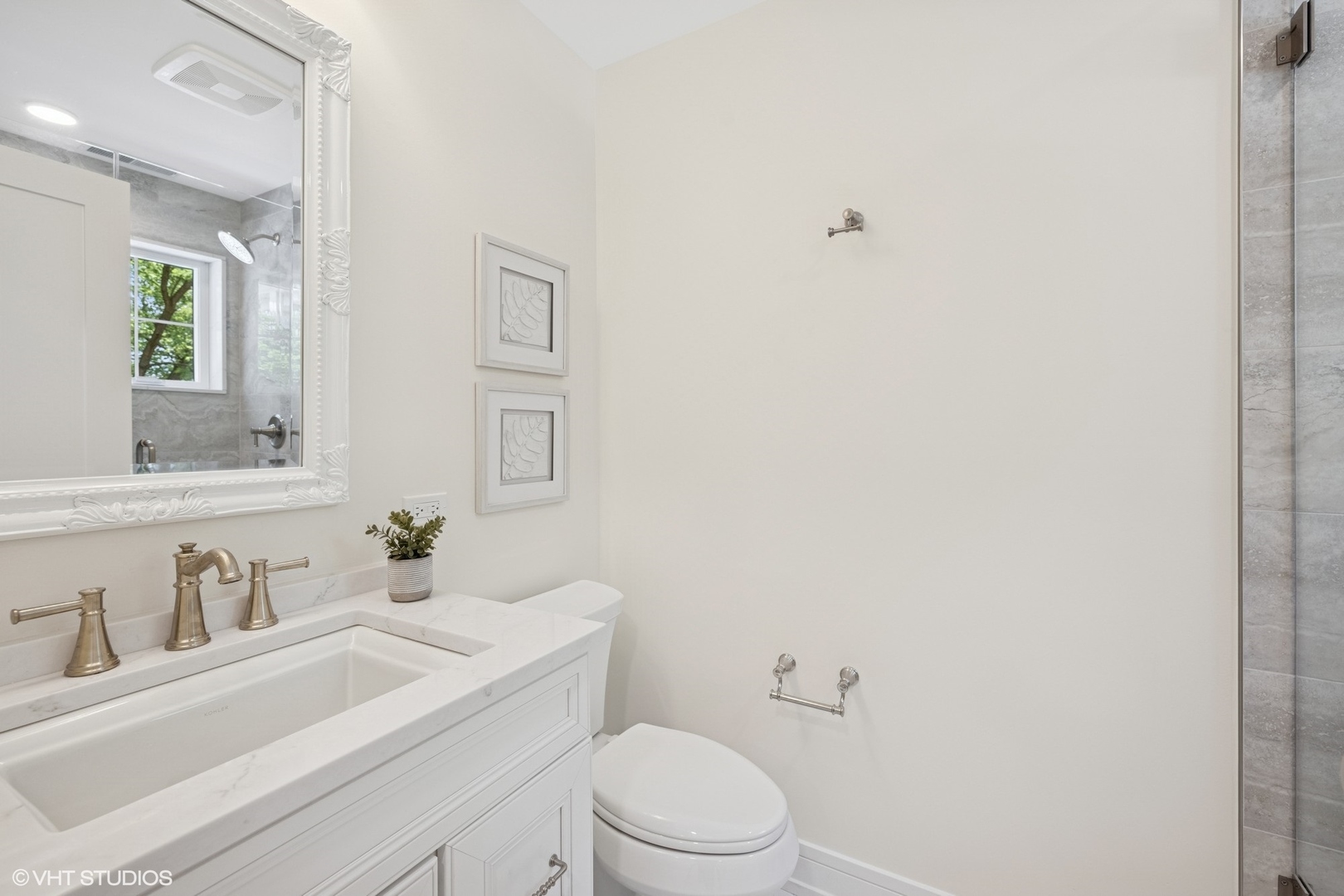 227 South Mitchell Avenue Arlington Heights, IL 60005 - Photo 23 of 40 a bathroom with a sink vanity mirror and toilet