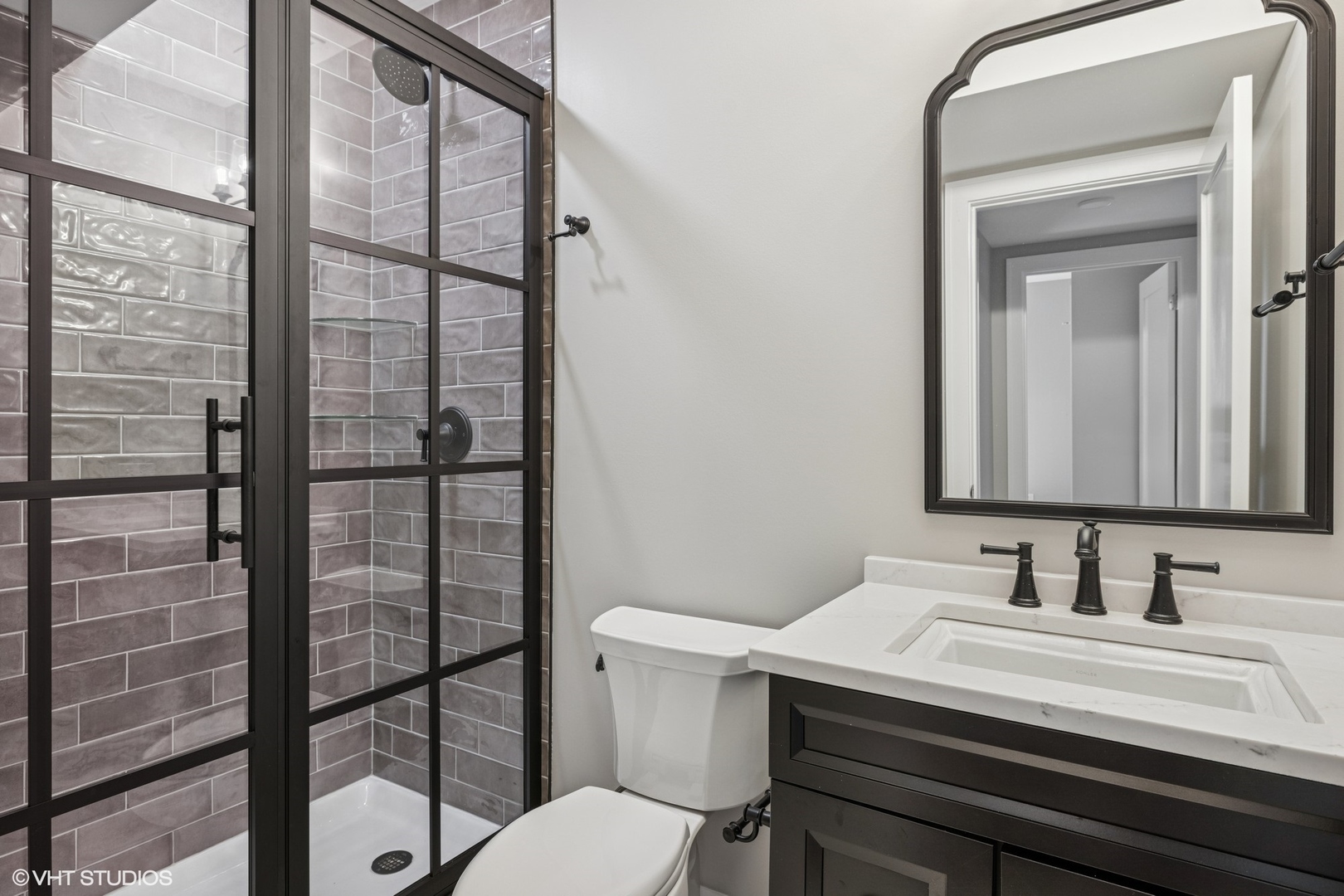 227 South Mitchell Avenue Arlington Heights, IL 60005 - Photo 32 of 40 a bathroom with a sink vanity mirror and toilet