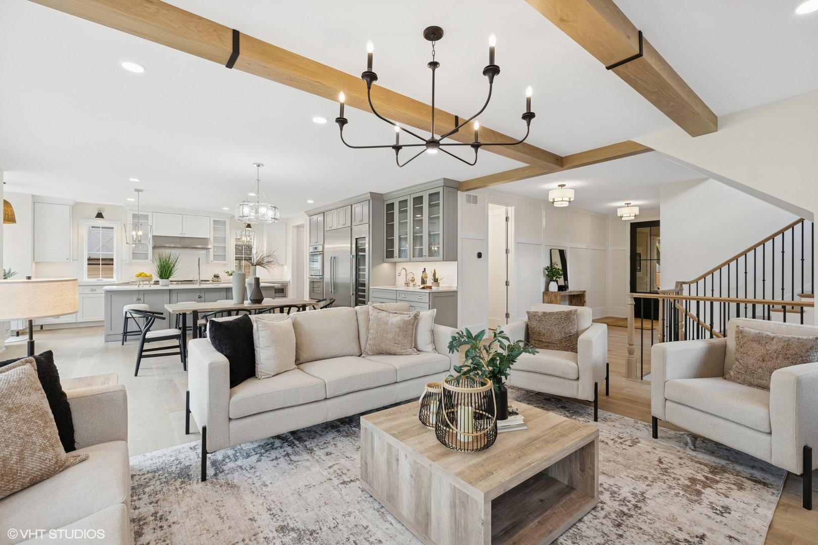 227 South Mitchell Avenue Arlington Heights, IL 60005 - Photo 5 of 40 a living room with furniture kitchen view and a chandelier