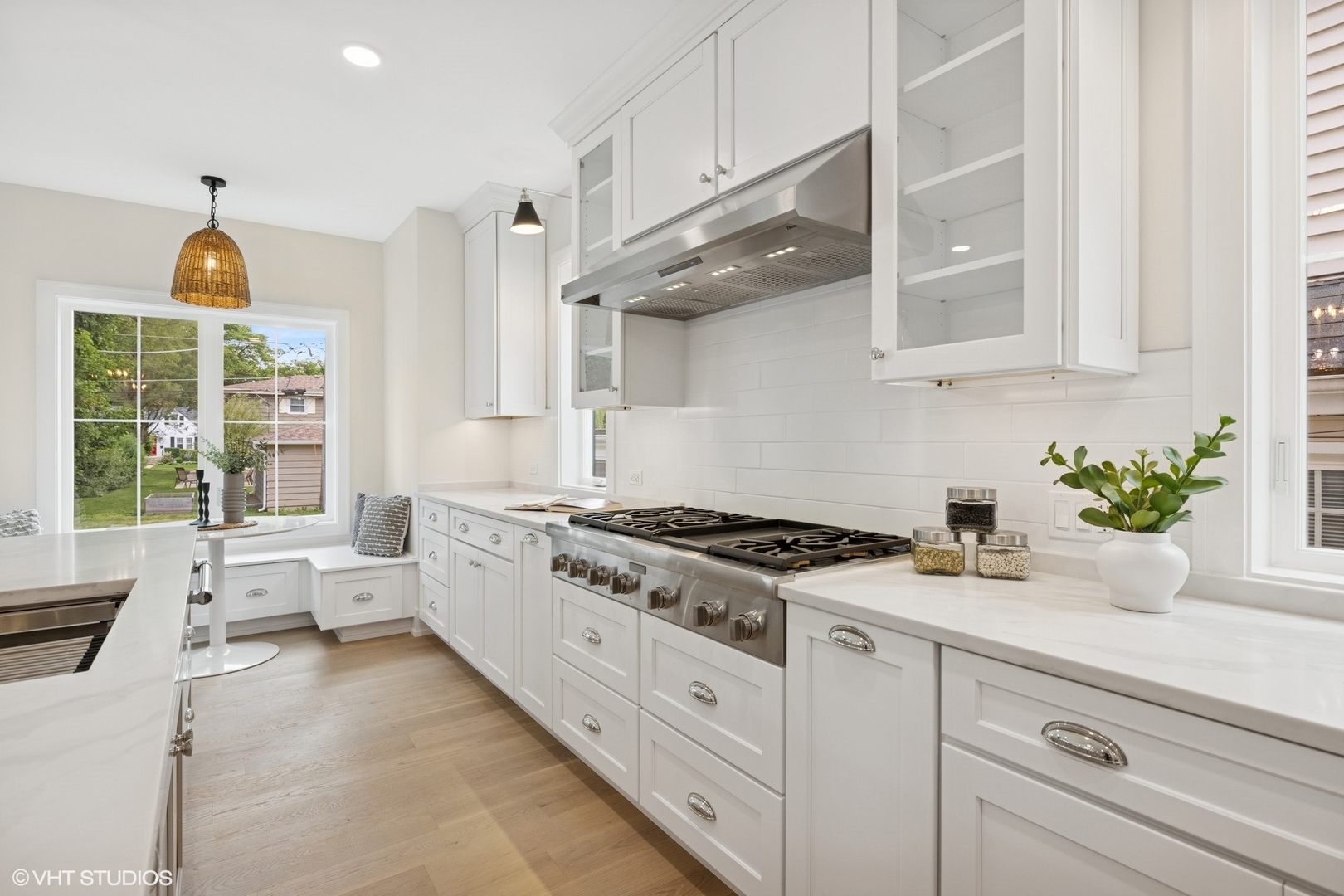 227 South Mitchell Avenue Arlington Heights, IL 60005 - Photo 10 of 40 a kitchen with stainless steel appliances white cabinets and a stove