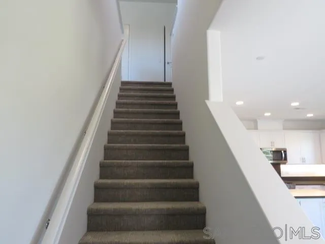 4382 Pacifica Way, Unit 5 Oceanside, CA 92056 - Photo 11 of 35 a view of entryway and hall