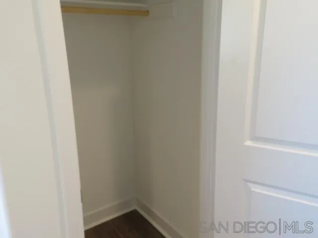 4382 Pacifica Way, Unit 5 Oceanside, CA 92056 - Photo 17 of 35 a small space with wooden floor