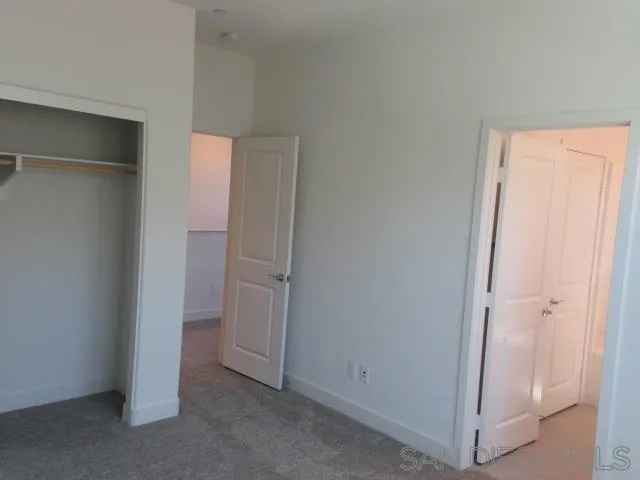 4382 Pacifica Way, Unit 5 Oceanside, CA 92056 - Photo 21 of 35 a view of an empty room