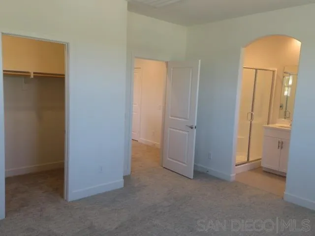 4382 Pacifica Way, Unit 5 Oceanside, CA 92056 - Photo 27 of 35 an empty room with closet area