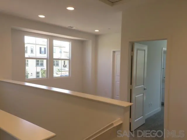 4382 Pacifica Way, Unit 5 Oceanside, CA 92056 - Photo 33 of 35 a view of empty room with windows