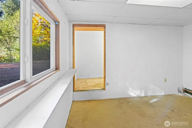 a bathroom with a sink vanity and mirror