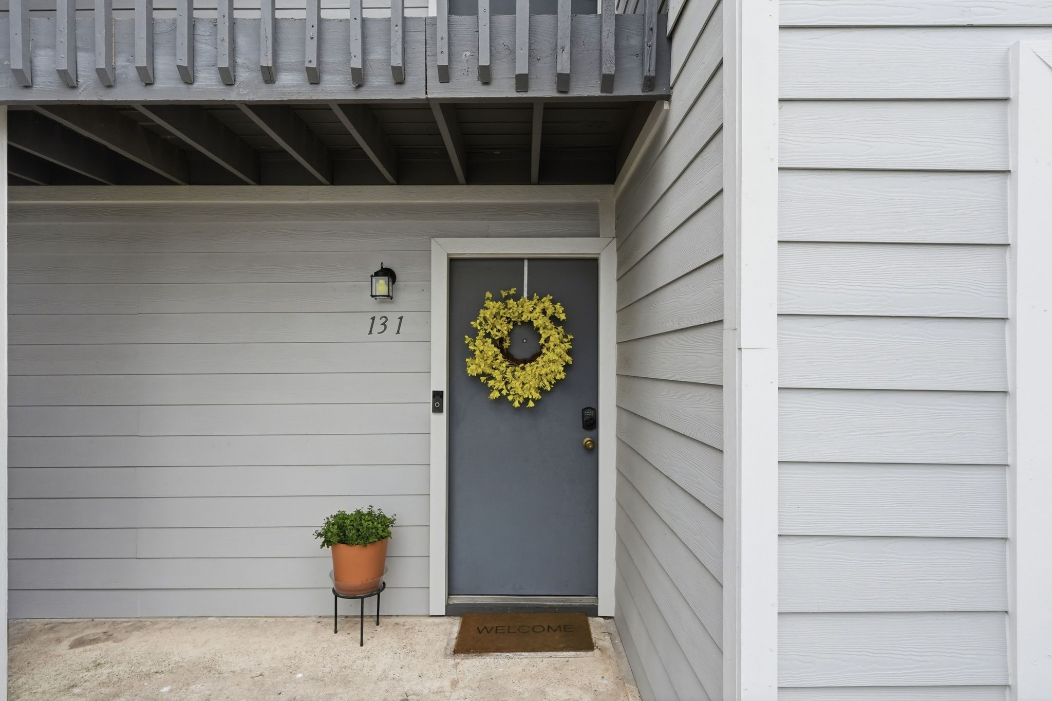 13151 Walden Road, Unit 131 Montgomery, TX 77356 - Photo 33 of 35 Inviting front door entry creating a warm welcome home.