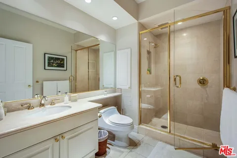 a view of a hallway with washer and dryer
