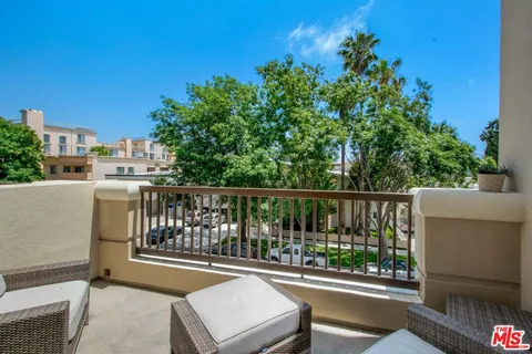 a view of a living room with furniture