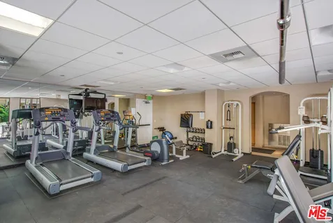 a view of a chairs and table in a patio