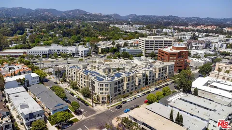a view of city with tall buildings