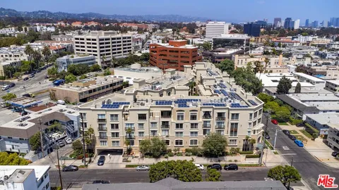 a view of city with tall buildings