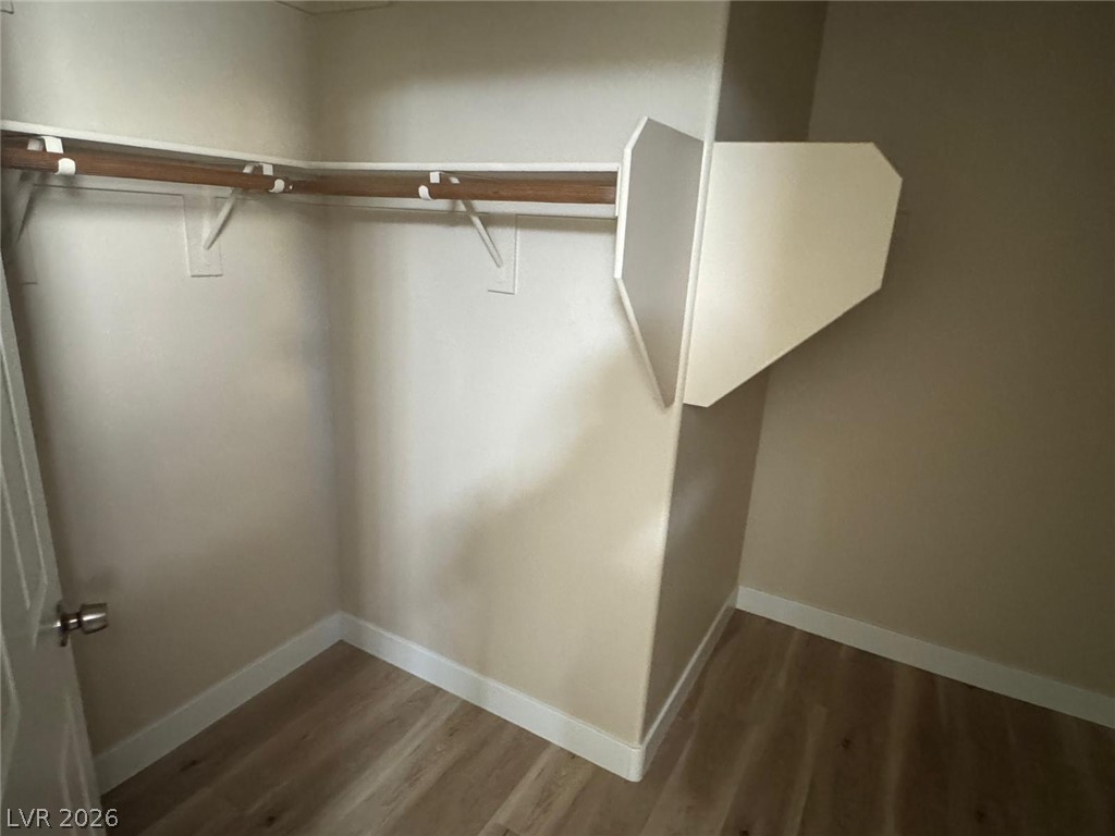 3962 Coyote Ridge Court Las Vegas, NV 89129 - Photo 25 of 35 Ample hanging space and shelving offer versatile organization options for all your belongings.
