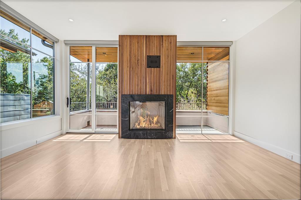 3619 Springbrook Street Dallas, TX 75205 - Photo 11 of 40 an empty room with windows and yard