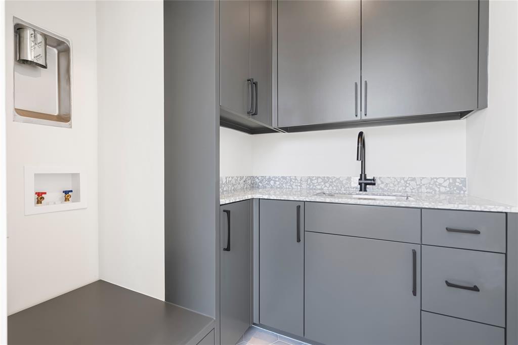 3619 Springbrook Street Dallas, TX 75205 - Photo 26 of 35 a kitchen with a sink and cabinets