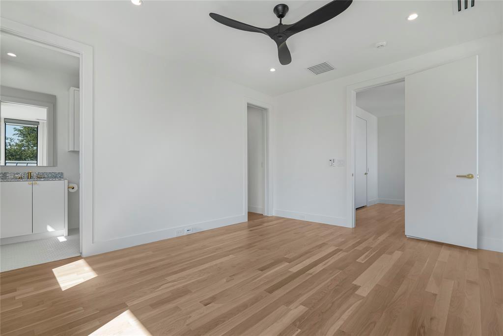 3619 Springbrook Street Dallas, TX 75205 - Photo 29 of 35 wooden floor in an empty room with a window