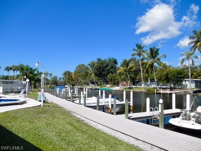 33 Henderson Drive Naples, FL 34114 - Photo 12 of 15 a view of a house with outdoor seating