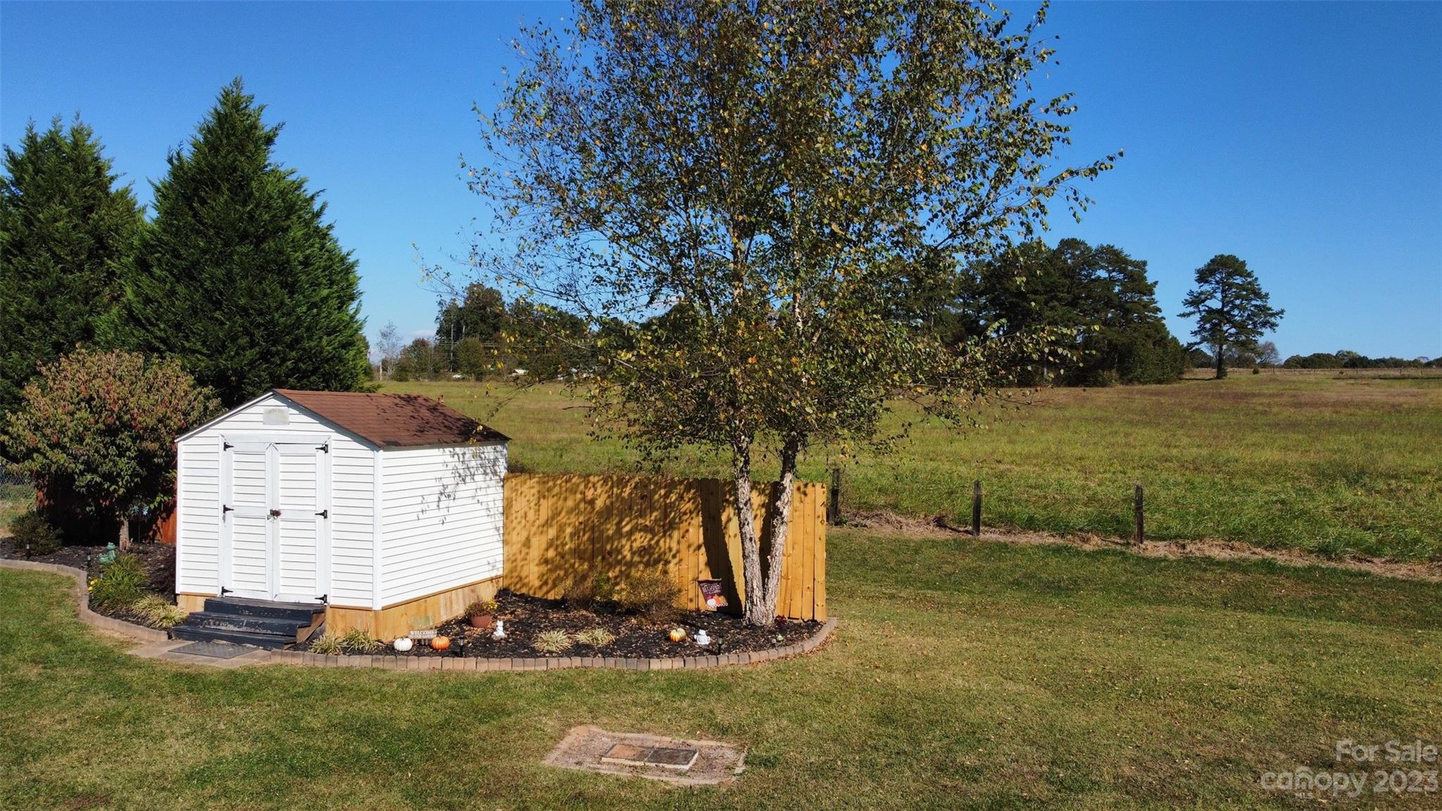 177 Potter's Road Woodleaf, NC 27054 - Photo 25 of 30 a view of a backyard