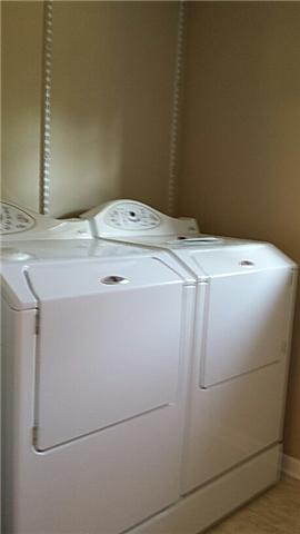 1001 Derryberry Farm Road Columbia, TN 38401 - Photo 17 of 20 Large utility room . Lots of shelving for pantry.
