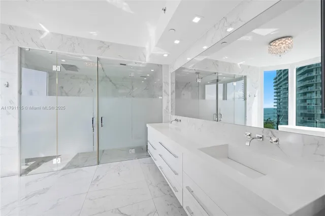a spacious bathroom with a tub sink and shower