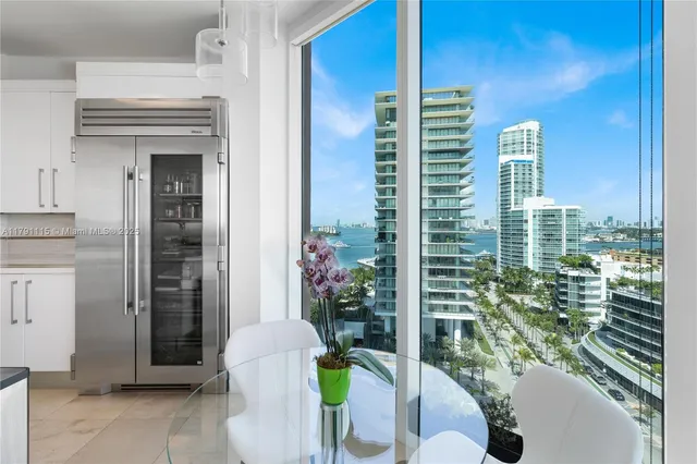a view of potted plant in front of a door