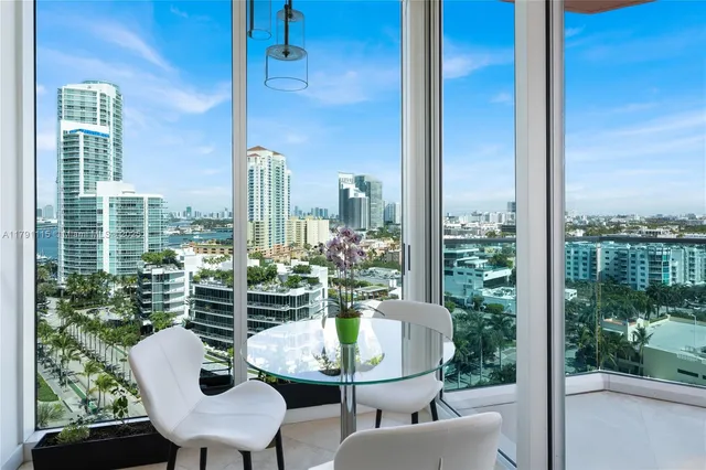a view of a balcony with chairs