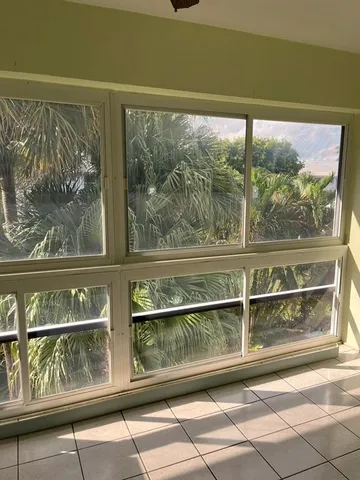 a view of a door and a street view