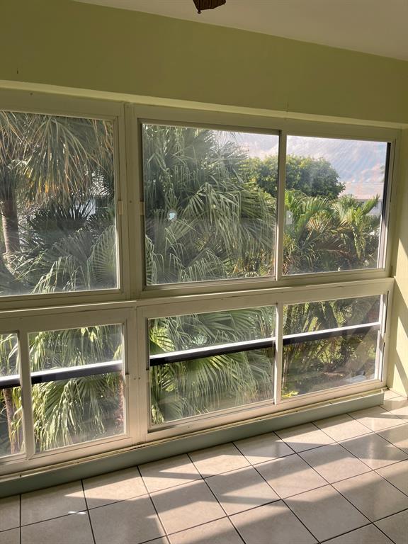 2050 Northeast 39th Street, Unit 312E Lighthouse Point, FL 33064 - Photo 10 of 17 a view of a door and a street view