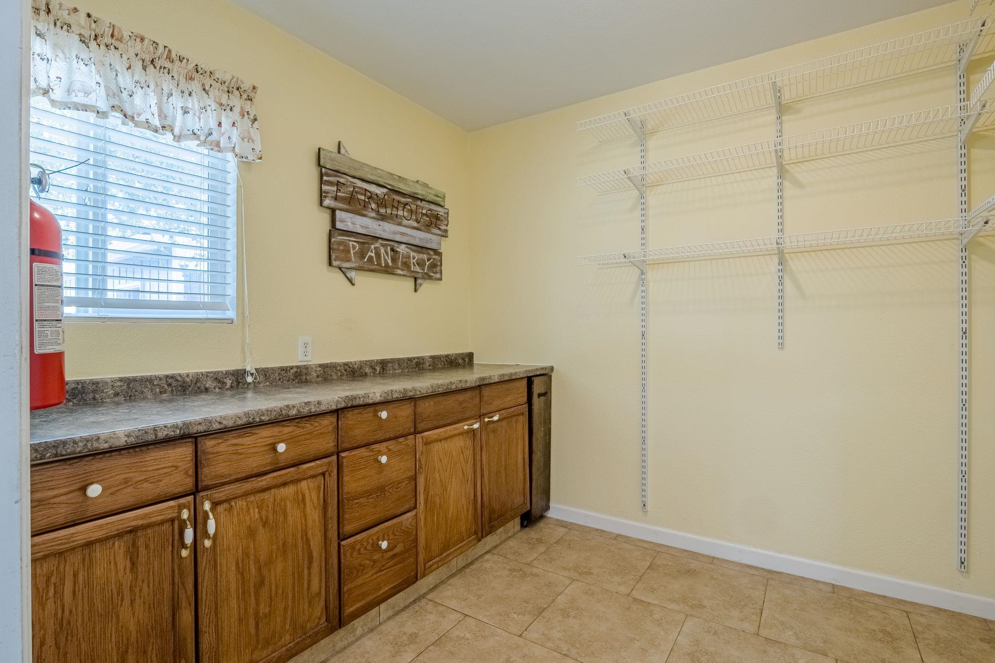 585-29 29 3/8 Road Grand Junction, CO 81504 - Photo 11 of 42 a bathroom with a granite countertop sink a mirror and a shower