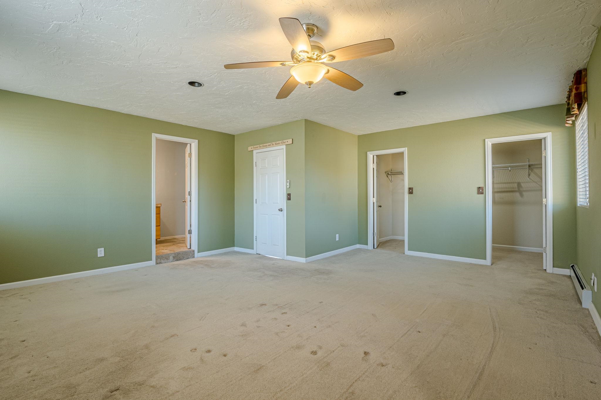 585-29 29 3/8 Road Grand Junction, CO 81504 - Photo 13 of 42 a view of an empty room with a ceiling fan