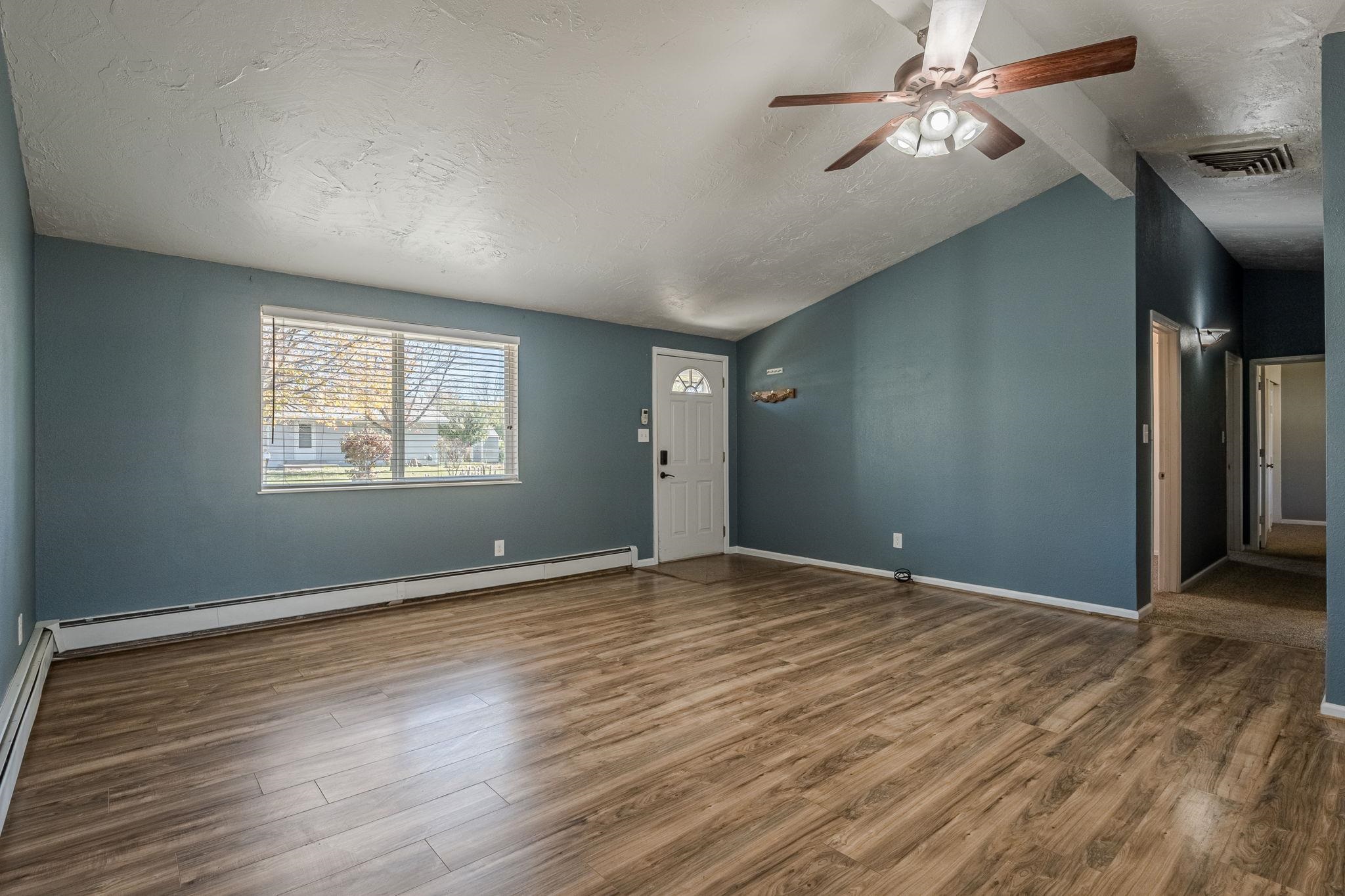 585-29 29 3/8 Road Grand Junction, CO 81504 - Photo 2 of 42 a view of an empty room with a window