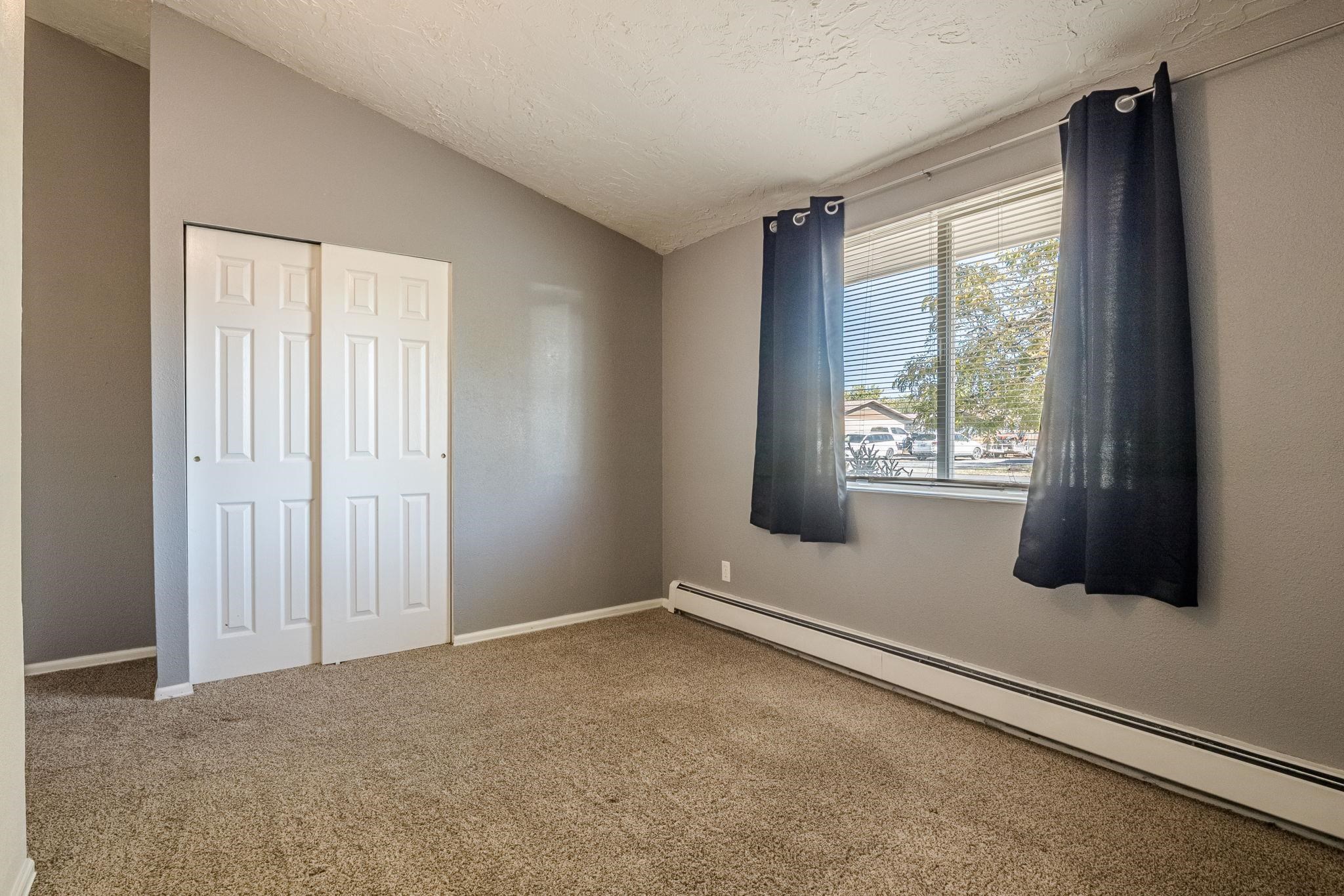 585-29 29 3/8 Road Grand Junction, CO 81504 - Photo 23 of 42 an empty room with windows