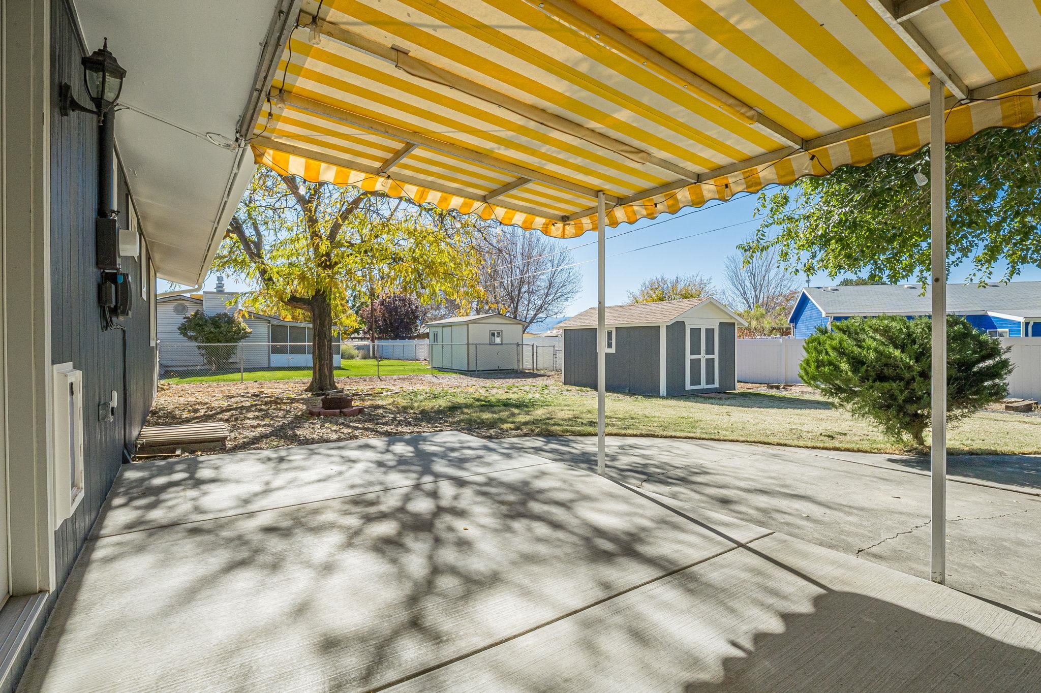 585-29 29 3/8 Road Grand Junction, CO 81504 - Photo 31 of 42 a view of a house with a backyard