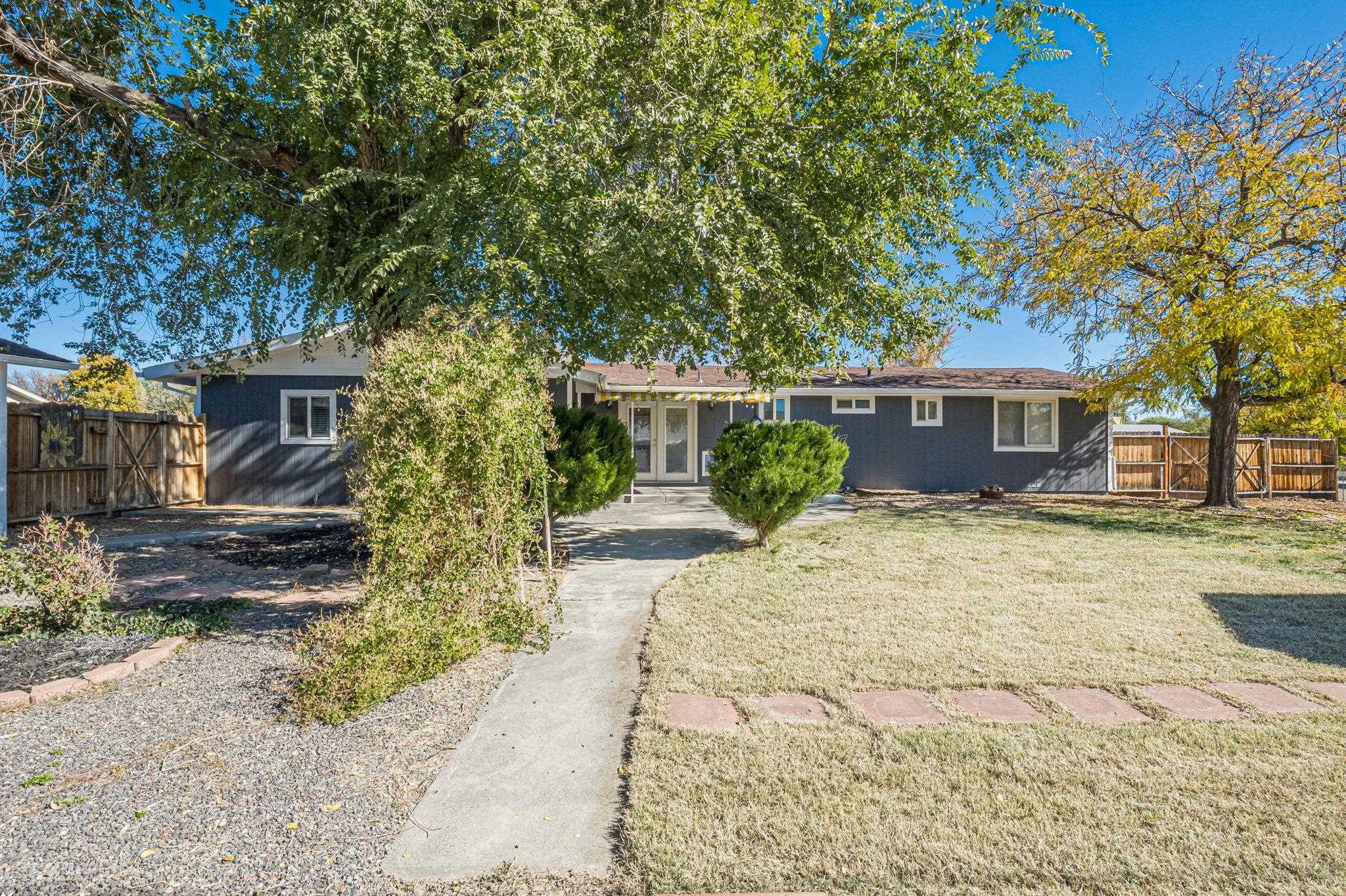 585-29 29 3/8 Road Grand Junction, CO 81504 - Photo 32 of 42 a view of a house with a patio