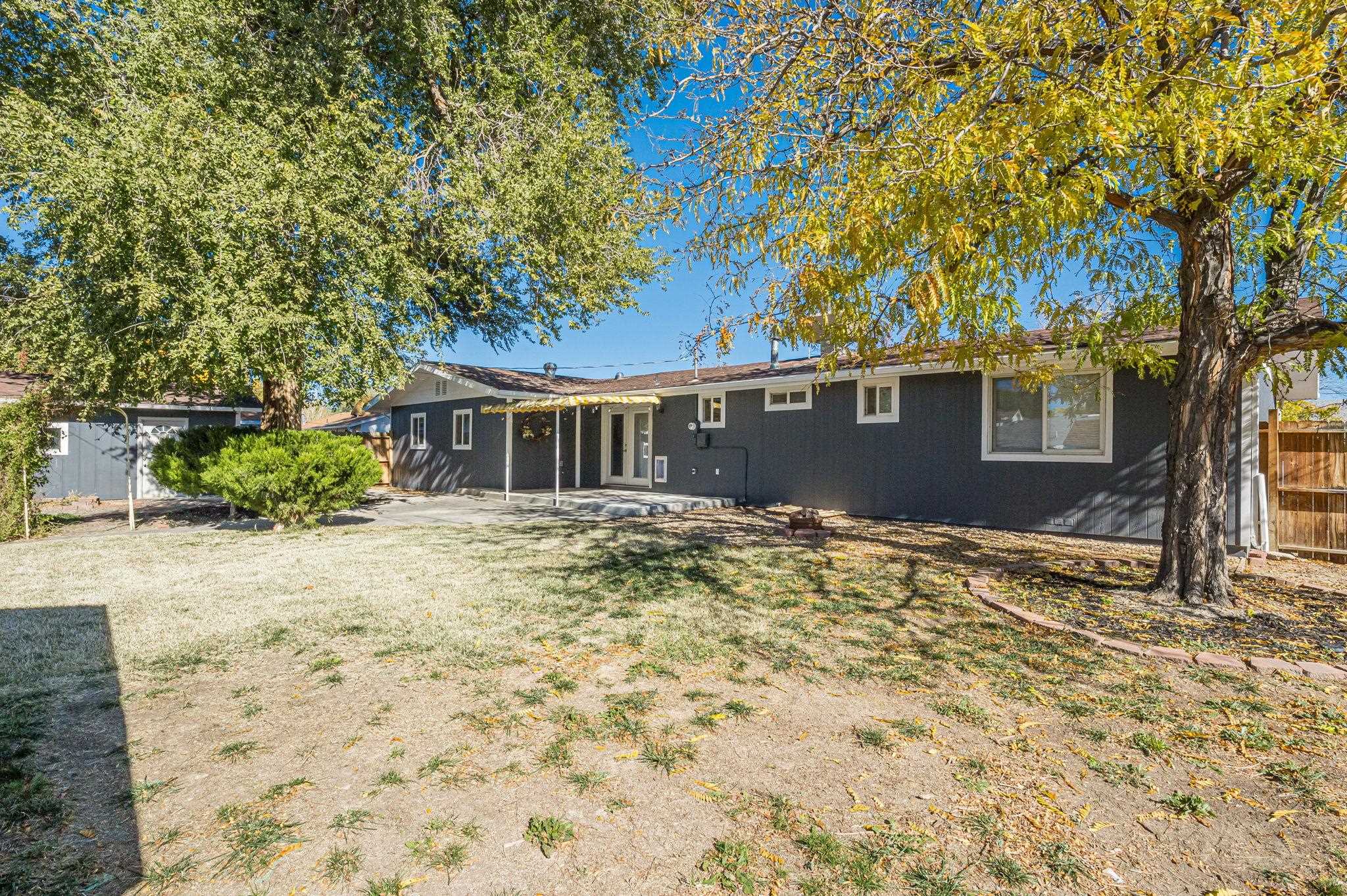 585-29 29 3/8 Road Grand Junction, CO 81504 - Photo 33 of 42 a view of a house with a yard