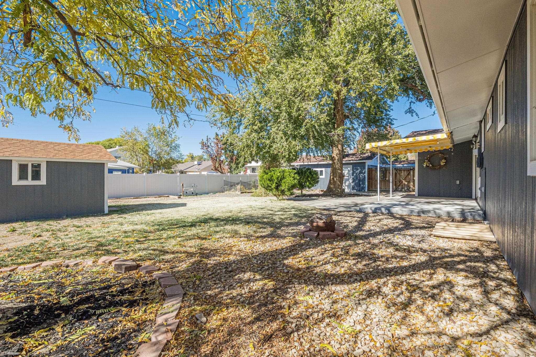 585-29 29 3/8 Road Grand Junction, CO 81504 - Photo 34 of 42 a view of a house with a yard